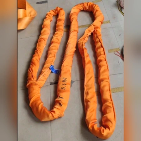 Long heavy duty polyester round sling standing on end, showing body length and sleeve