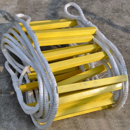Close view of a rope ladder rung fixed between two braided nylon stringers