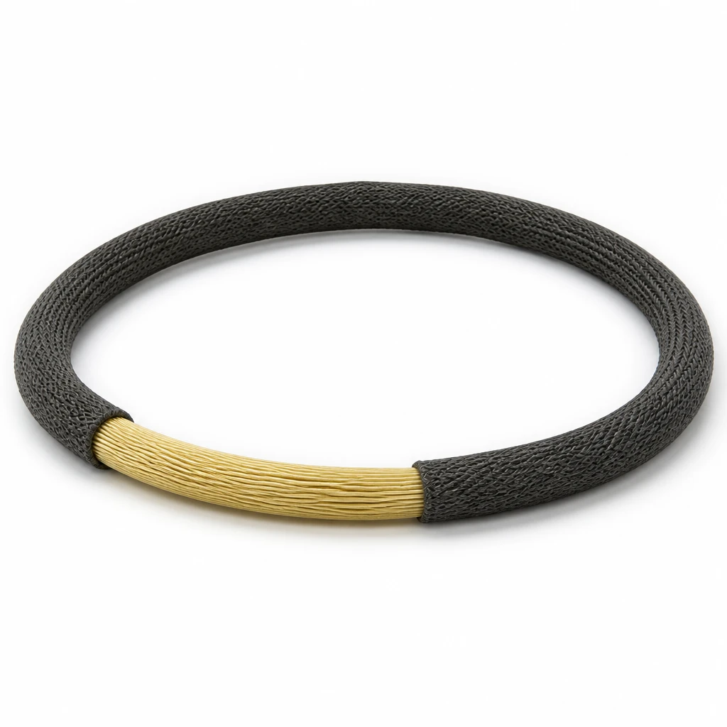 High temperature round sling with a dark graphite heat-resistant sleeve slid back to expose a golden aramid core