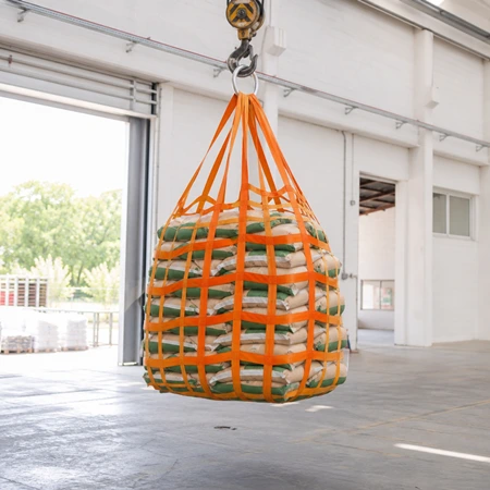Webbing net in bag form lifting a stack of bagged goods from a single crane hook